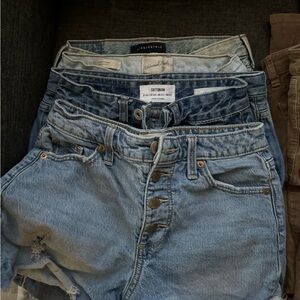 Bundle of pants and one pair of shorts